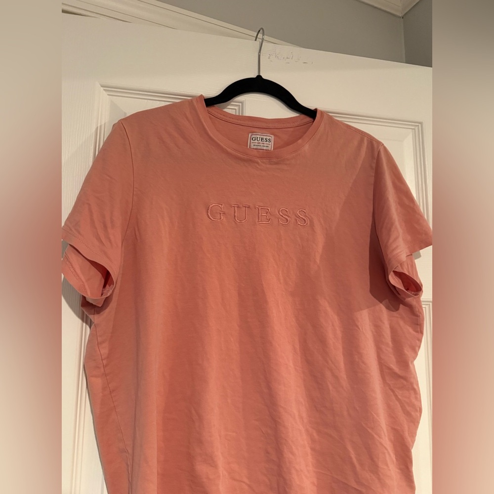Guess peach shirt 
Size L